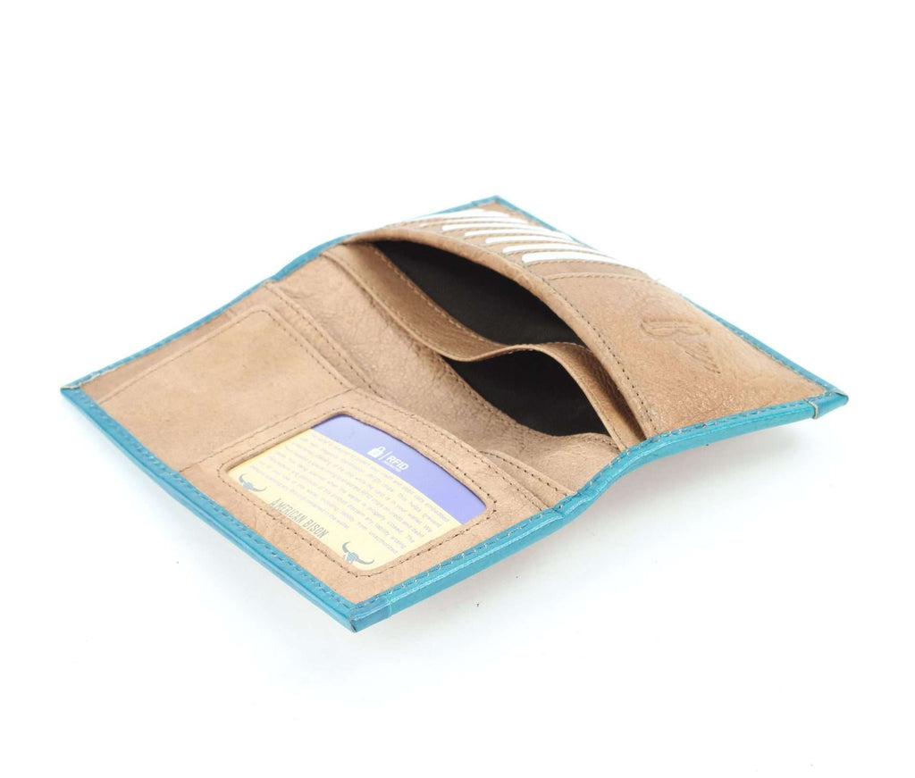 Tan tooled leather wallet with turquoise stone